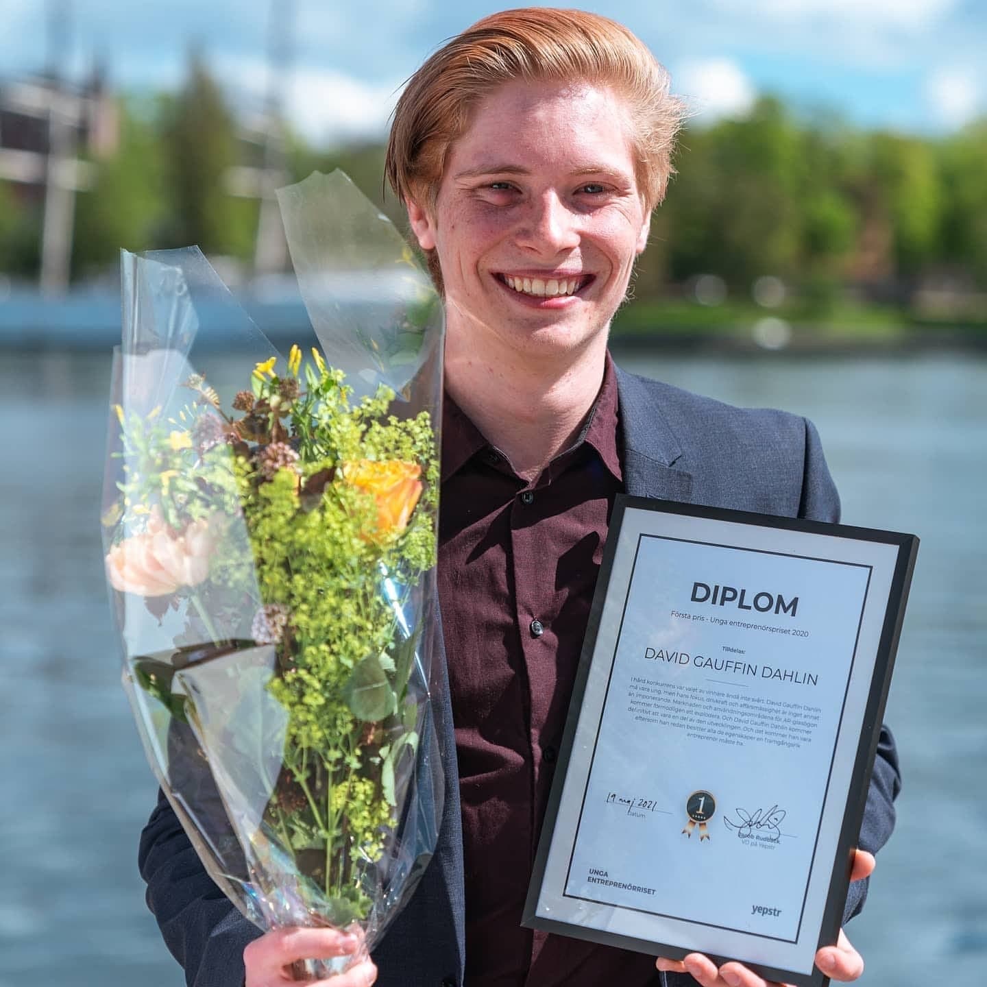 David Gauffin holding the Young Entrepreneur Award